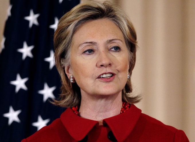 Secretary of State Clinton speaks during a luncheon in honor of Indian PM Singh