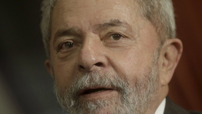 Brazil's former President Lula da Silva  reacts during a meeting with  Rio de Janeiro's Governor Pezao in Rio de Janeiro